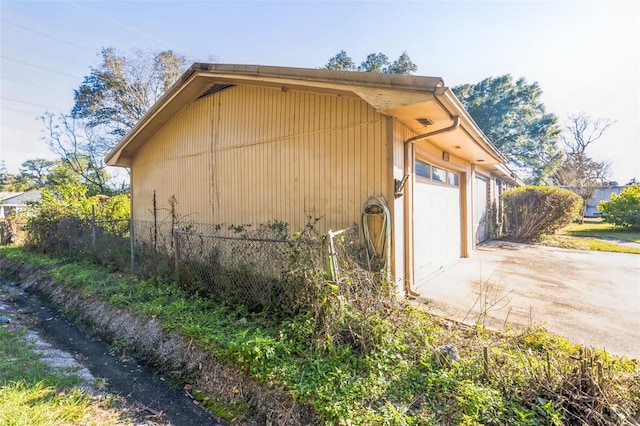 view of home's exterior featuring a garage