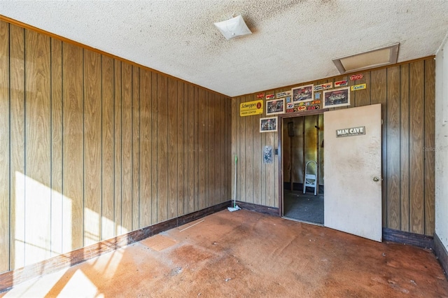 empty room with wood walls