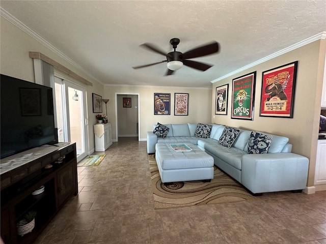 living room with ceiling fan, ornamental molding, and a textured ceiling