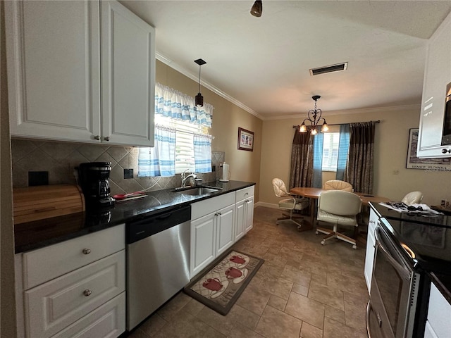 kitchen featuring a healthy amount of sunlight, white cabinetry, sink, and appliances with stainless steel finishes