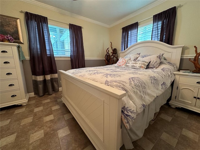 bedroom with multiple windows and crown molding