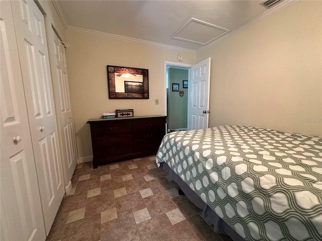 bedroom with a closet and ornamental molding