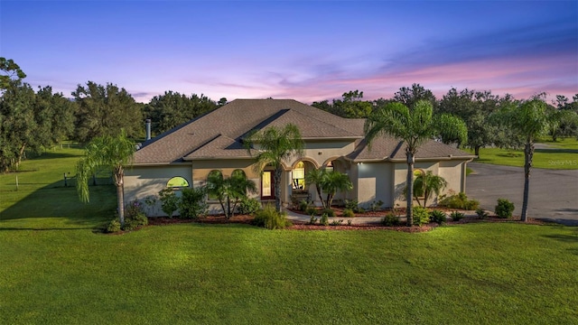 view of front of house featuring a yard