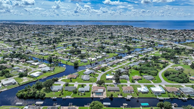 drone / aerial view featuring a water view