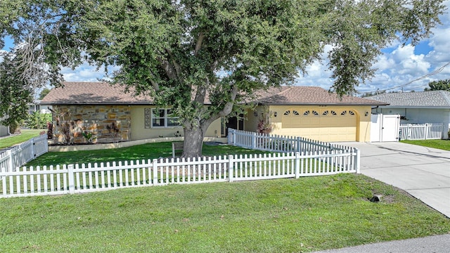 single story home featuring a front lawn and a garage