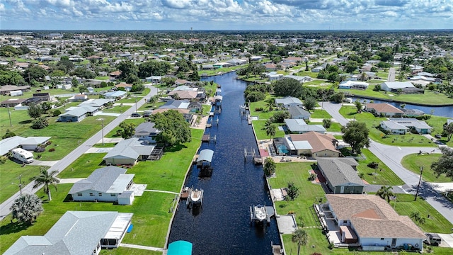 bird's eye view with a water view