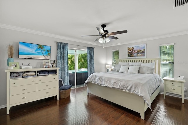 bedroom with multiple windows, ceiling fan, and ornamental molding