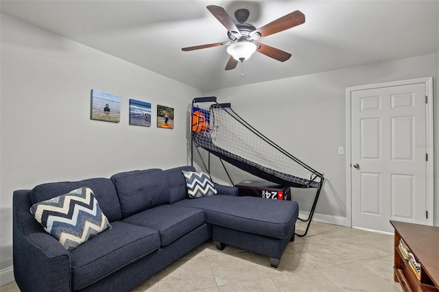 tiled living room featuring ceiling fan