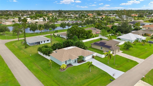 bird's eye view with a water view