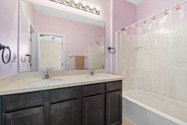 bathroom with vanity, shower / bath combo with shower curtain, and tile patterned floors