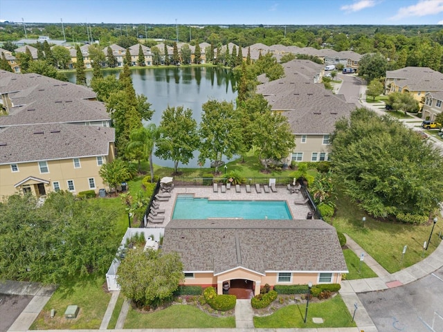 drone / aerial view with a water view