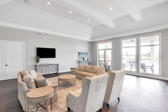 living room with baseboards, beam ceiling, and recessed lighting