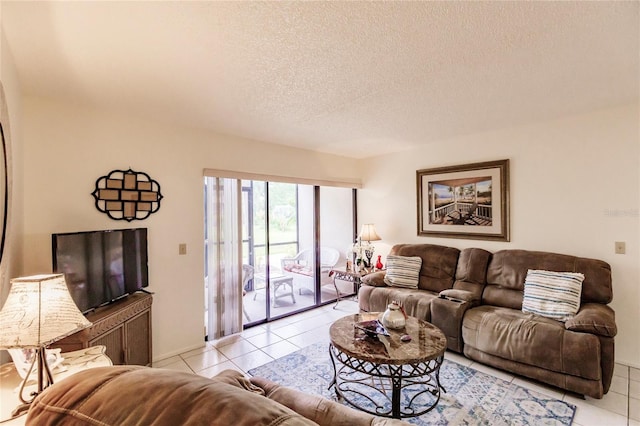 tiled living room with a textured ceiling