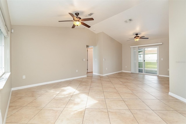 tiled spare room featuring ceiling fan and lofted ceiling