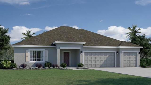 view of front of house featuring a front lawn and a garage