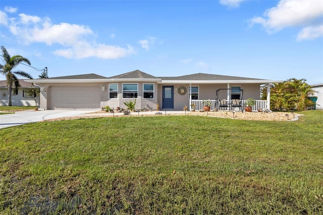 ranch-style house featuring a front yard, a garage, and a porch