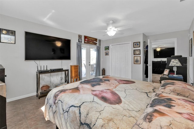 tiled bedroom with a closet, french doors, and ceiling fan