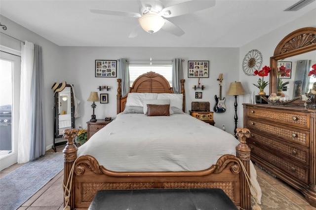 bedroom featuring light tile patterned floors and ceiling fan