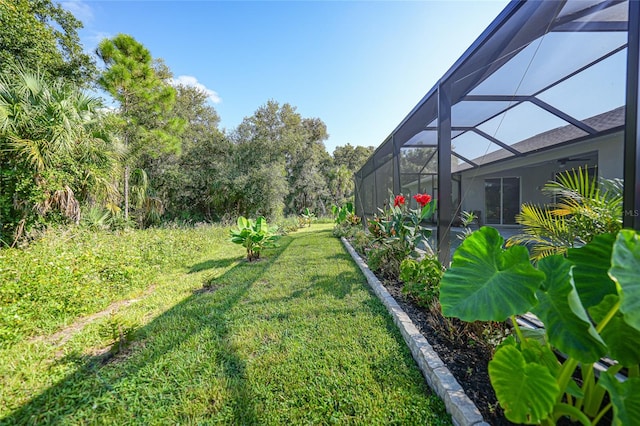 view of yard featuring a lanai