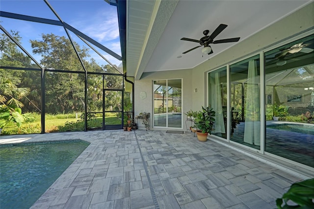 unfurnished sunroom featuring a pool and ceiling fan