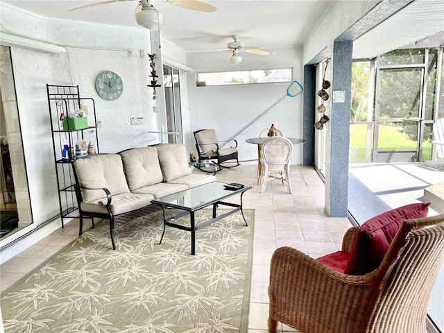 tiled living room featuring ceiling fan