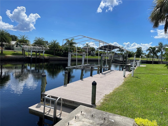 view of dock featuring a water view and a lawn