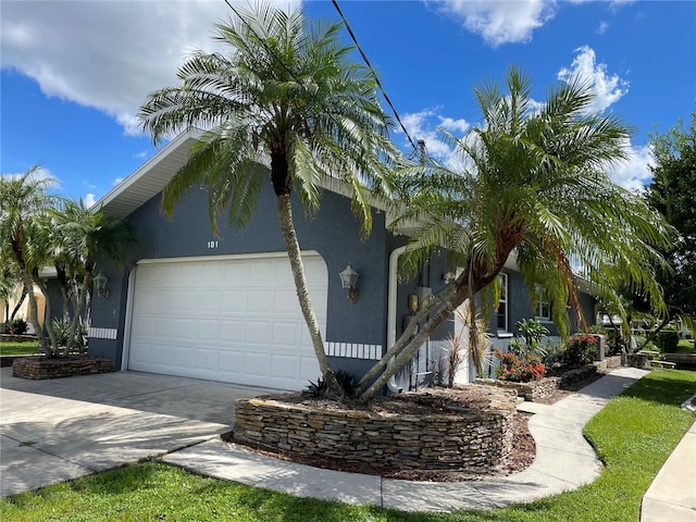 view of property exterior featuring a garage