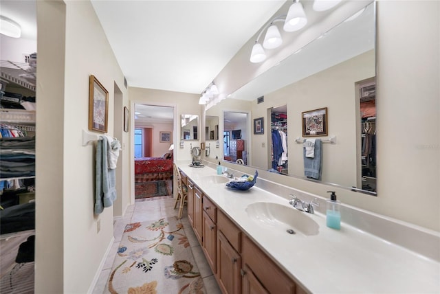 bathroom featuring vanity and tile patterned floors