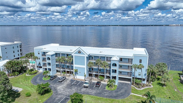 drone / aerial view with a water view