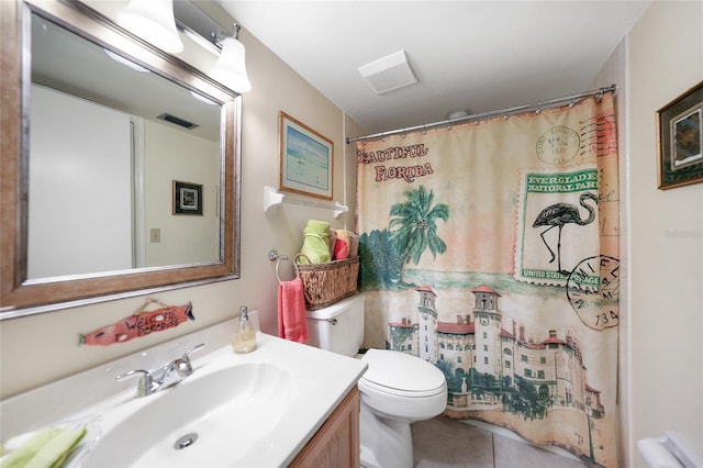 bathroom featuring walk in shower, vanity, and toilet