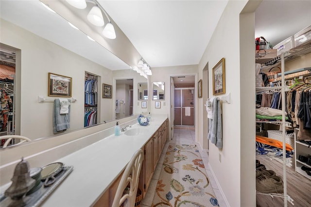 bathroom featuring vanity and tile patterned floors