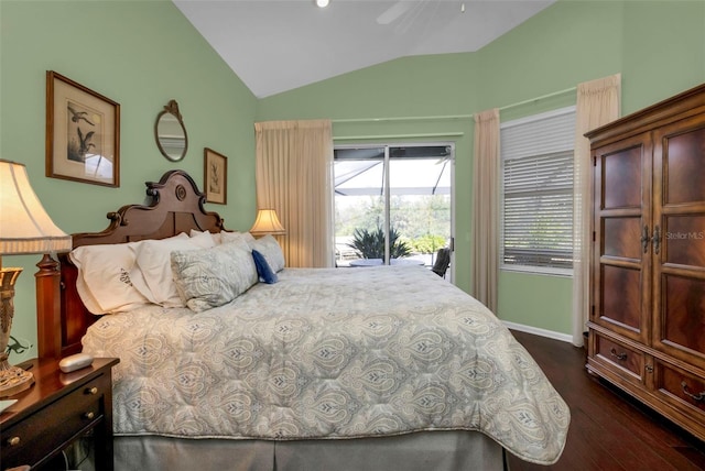 bedroom featuring vaulted ceiling, ceiling fan, access to outside, and dark hardwood / wood-style flooring