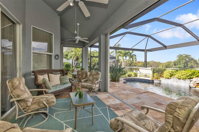 view of patio / terrace with a pool with hot tub, a water view, a lanai, and ceiling fan