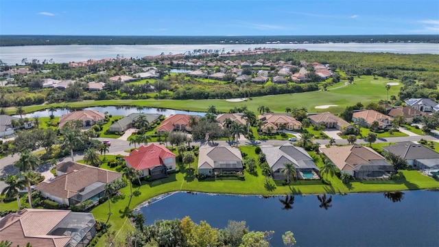 birds eye view of property featuring a water view