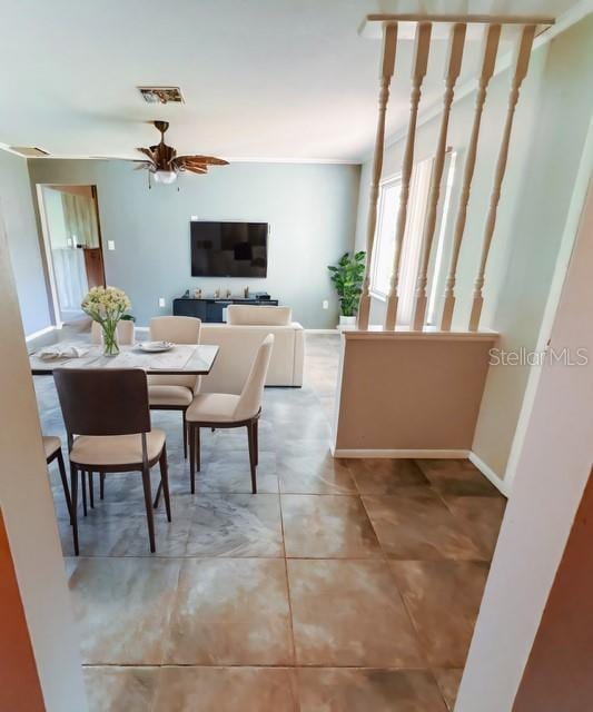 dining area with ceiling fan