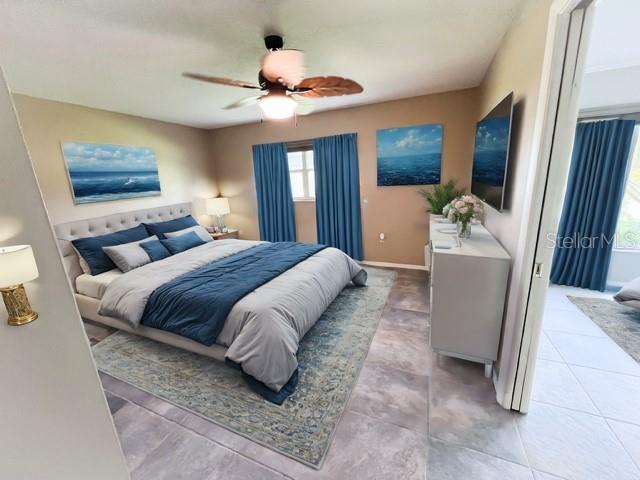 bedroom featuring ceiling fan