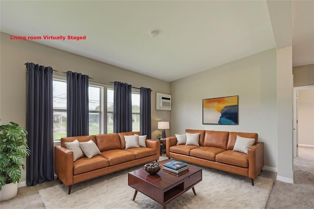 living room featuring light colored carpet and a wall mounted air conditioner