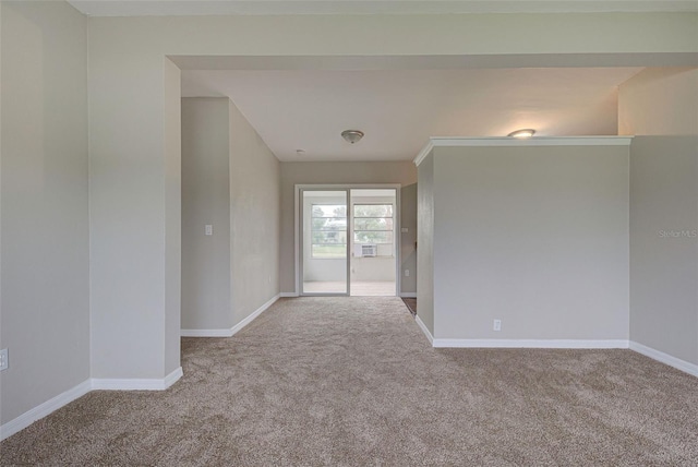 unfurnished room with carpet