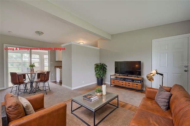 living room with beamed ceiling and hardwood / wood-style flooring