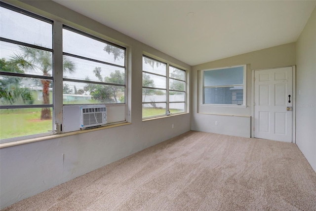 unfurnished sunroom with cooling unit and lofted ceiling