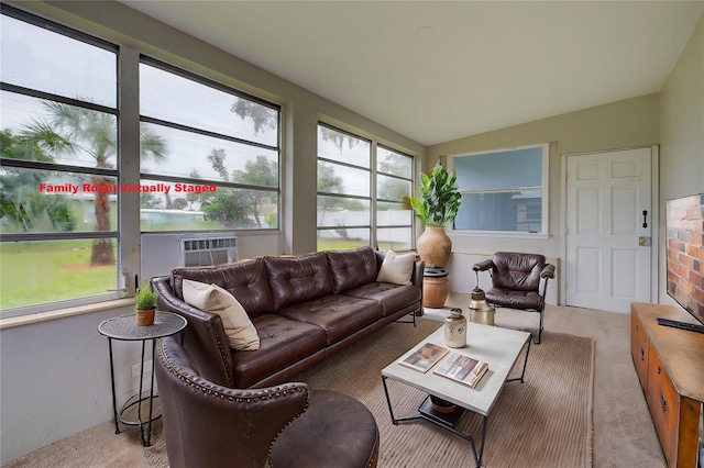 sunroom featuring vaulted ceiling