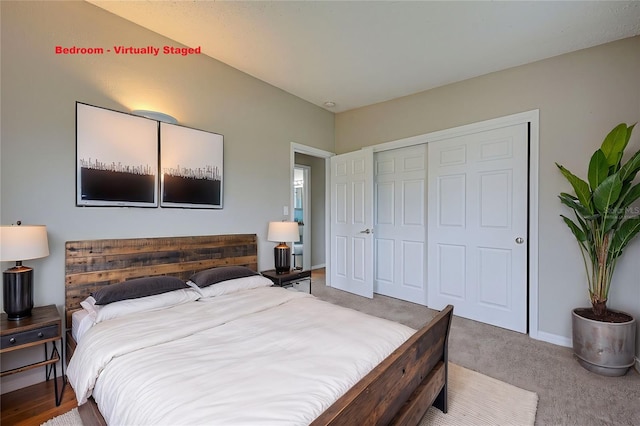 bedroom with a closet and carpet flooring