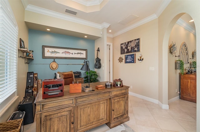 office area with ornamental molding and light tile patterned flooring