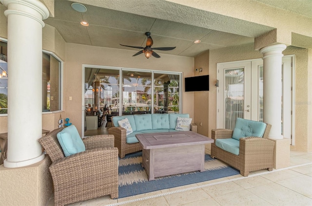 view of patio featuring outdoor lounge area and ceiling fan