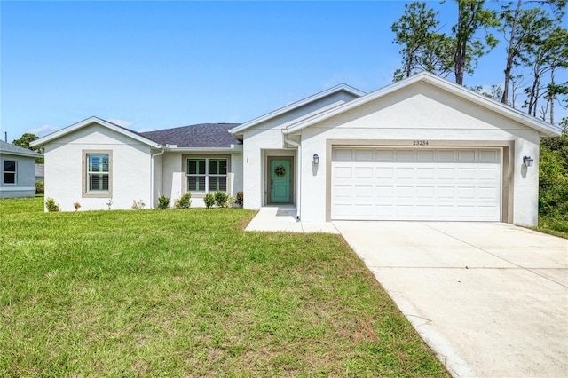 ranch-style home featuring a garage and a front lawn