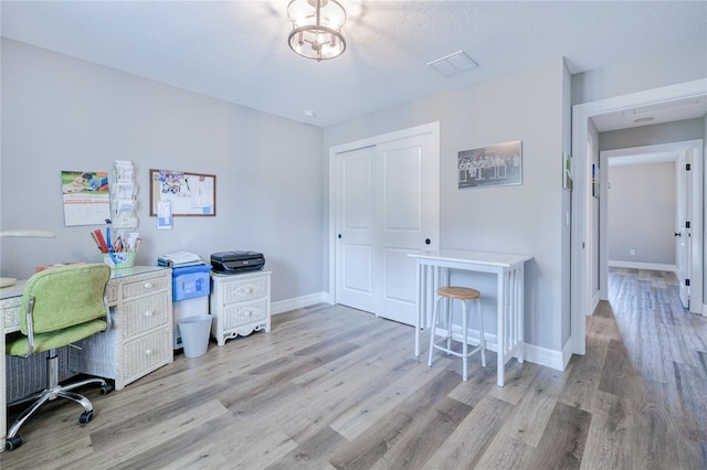 office area featuring light hardwood / wood-style flooring