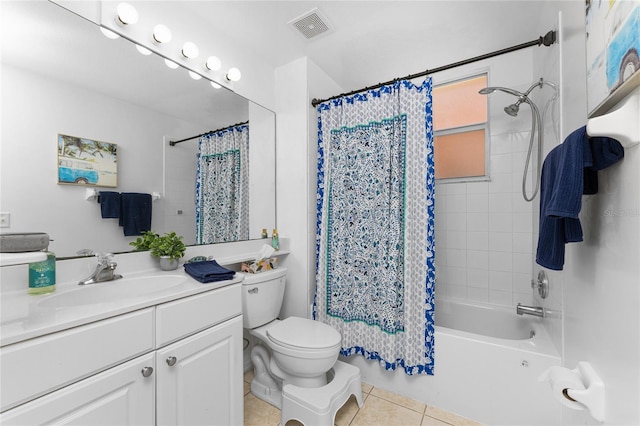 full bathroom featuring shower / tub combo with curtain, tile patterned floors, vanity, and toilet