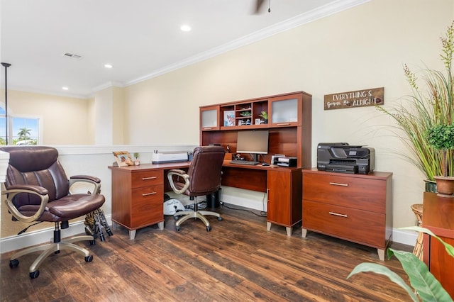 home office with dark hardwood / wood-style flooring and ornamental molding