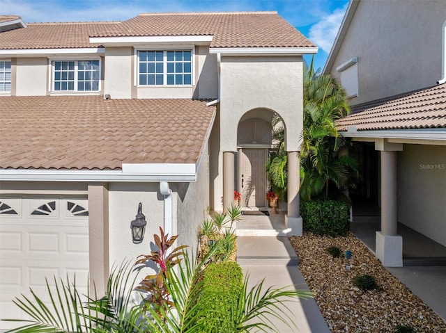 view of front of property with a garage