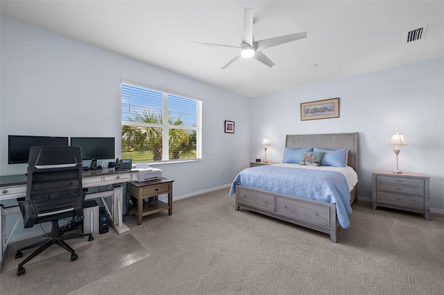 bedroom featuring ceiling fan and light colored carpet